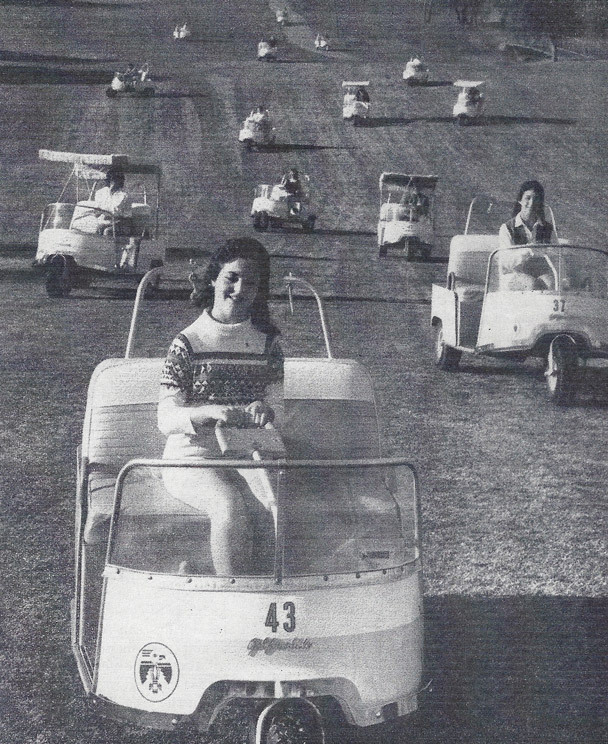 Mrs Hubbard in golf cart